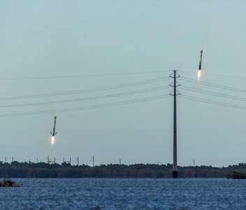 Two_Boosters_Landing_at_Kennedy_Space_Center.jpg