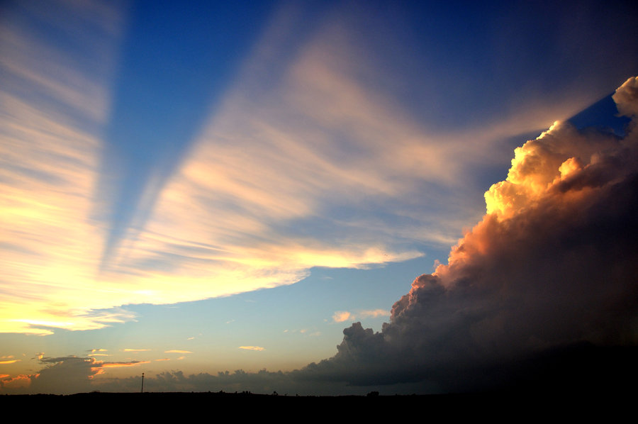 Supercells_at_Sunset_by_Bvilleweatherman.jpg