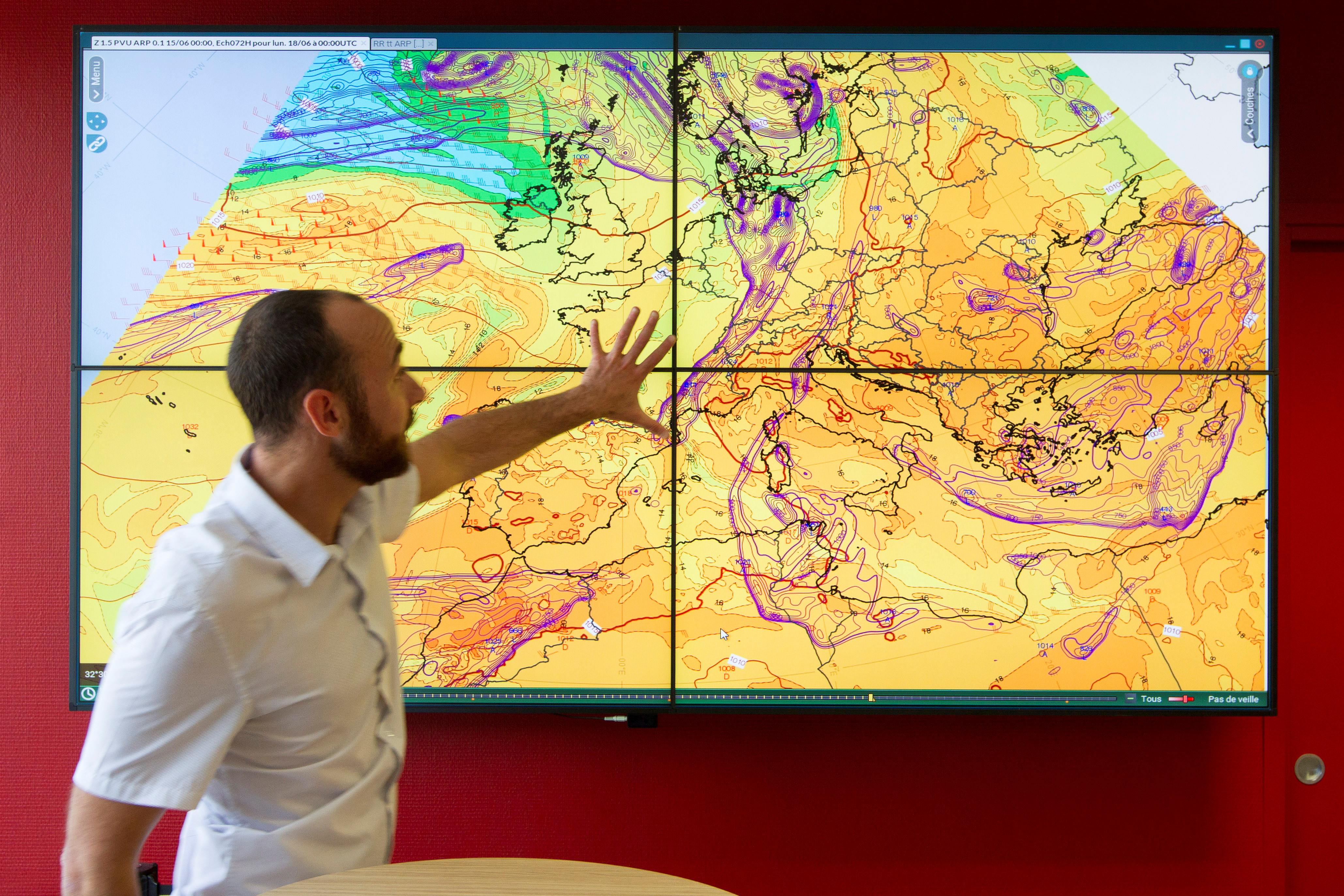 Weather maps are seen during a visit at the EDFDTG division for weather forecasts in Grenoble, France, June 15, 2018.